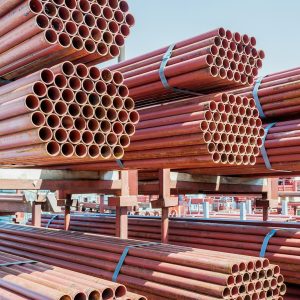 Stack of steel pipes for scaffolding in stock. Stack of steel pipes for scaffolding in stock.